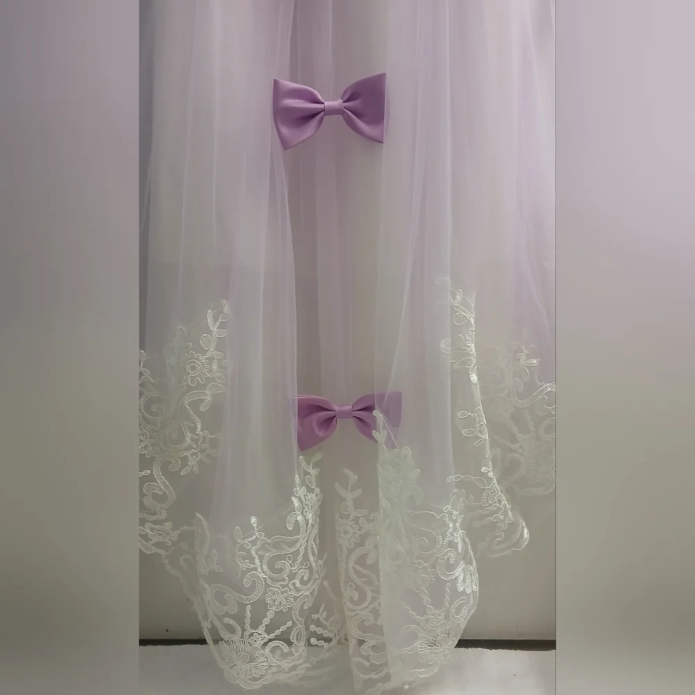 Elegant White and Purple Dress with Bows At Back And Down Length Of Dress.